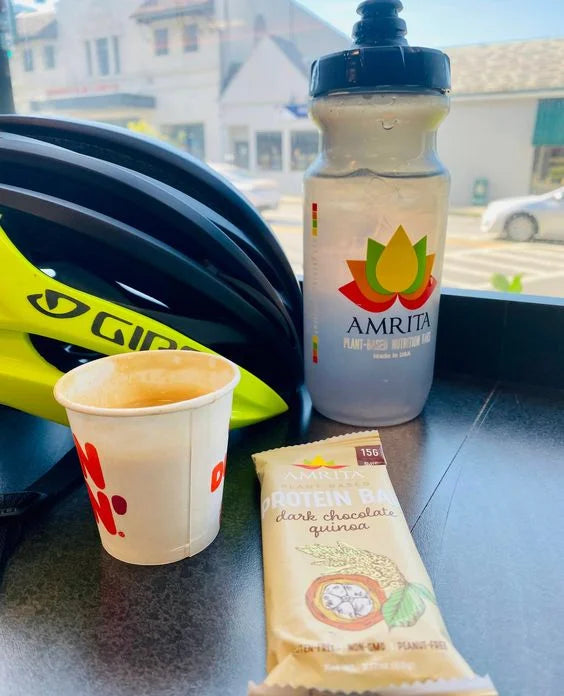 Cycling and eating Amrita Protein Bar